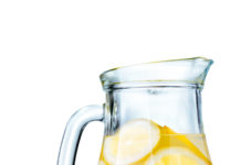 Lemonade pitcher with lemons