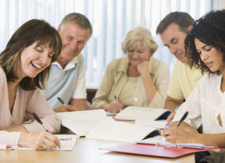 Adult students studying together