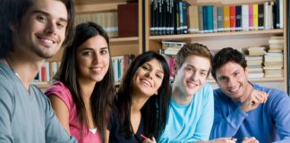 Group of young students studying