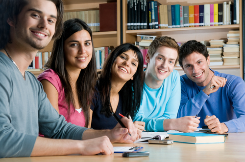 Group of young students studying 